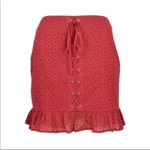 Eyelet lace up peplum skirt
